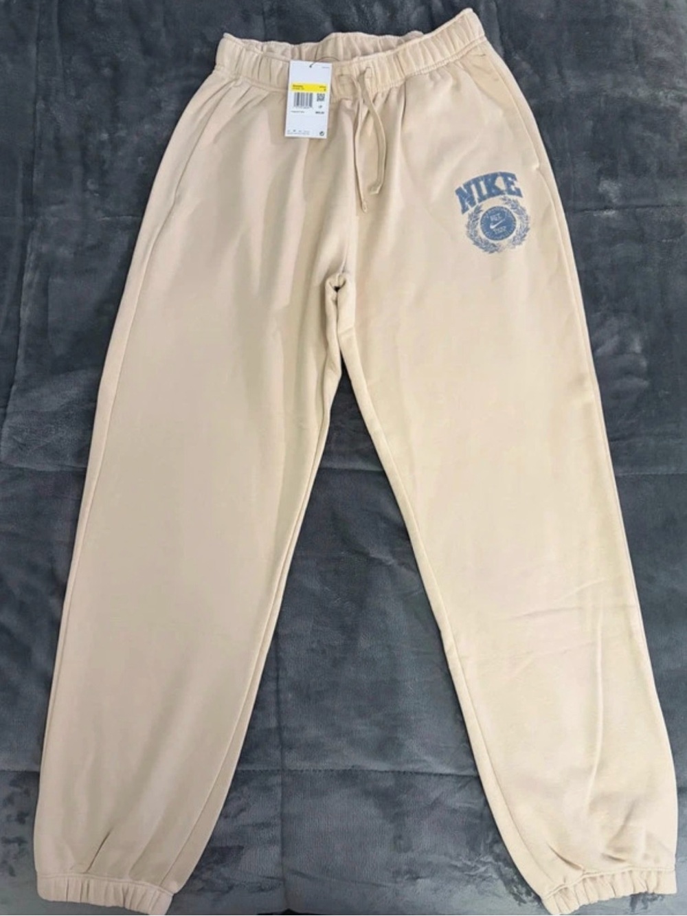 Nike Beige Jogger Sweatpants with Blue Logo
